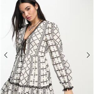 Reclaimed Vintage tie front and back smock dress in black and white broderie